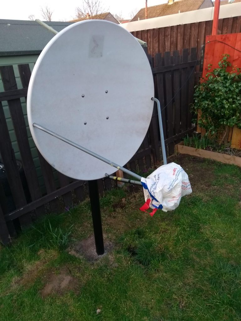 Channel Master 1.2m offset dish in the back garden, on a 6ft steel pole.